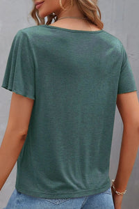 Classic V-neck tee by Trendsi, a versatile blouse or shirt with a simple V-neck design, shown in a neutral fabric.