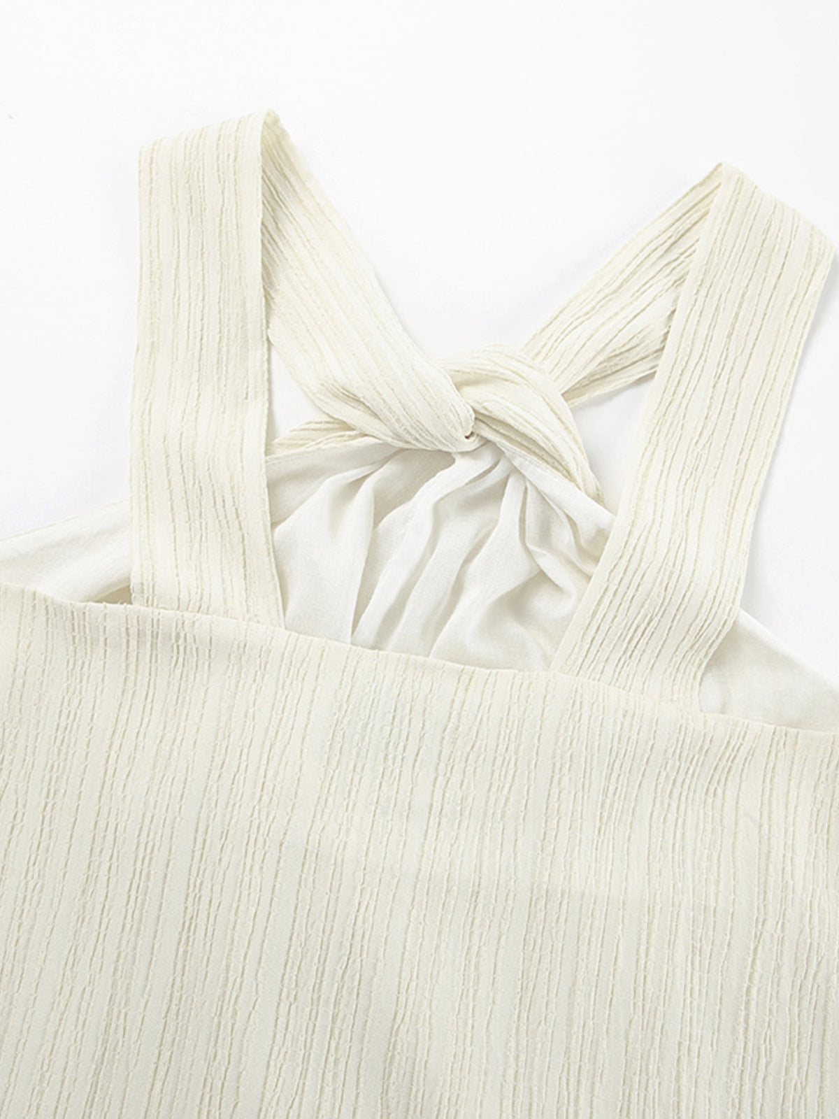 Elegant black halter neck maxi dress from Trendsi, flowing fabric and open back design perfect for summer occasions.