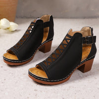 Open toe block heel sandals by Trendsi featuring a stylish design with sturdy heel and open toe for a fashionable look.