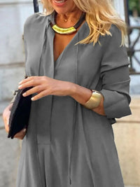 Solid color maxi shirt dress by Trendsi, featuring a relaxed fit, button-down front, and long sleeves.