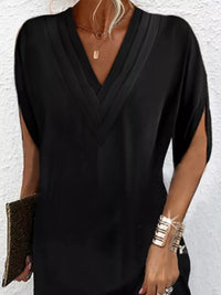 Plus size full size V-neck mini dress with slit sleeves in a stylish design by Trendsi.