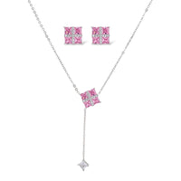 White gold plated jewelry set with pink cubic zirconia stones in geometric cross design, featuring Y-necklace and square stud earrings