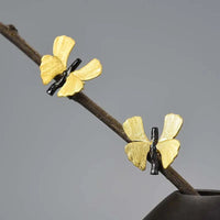 Pequeño pendiente de mariposa