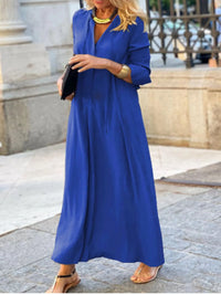 Trendsi solid color maxi shirt dress featuring a relaxed fit and button-down front, perfect for casual or semi-formal wear.
