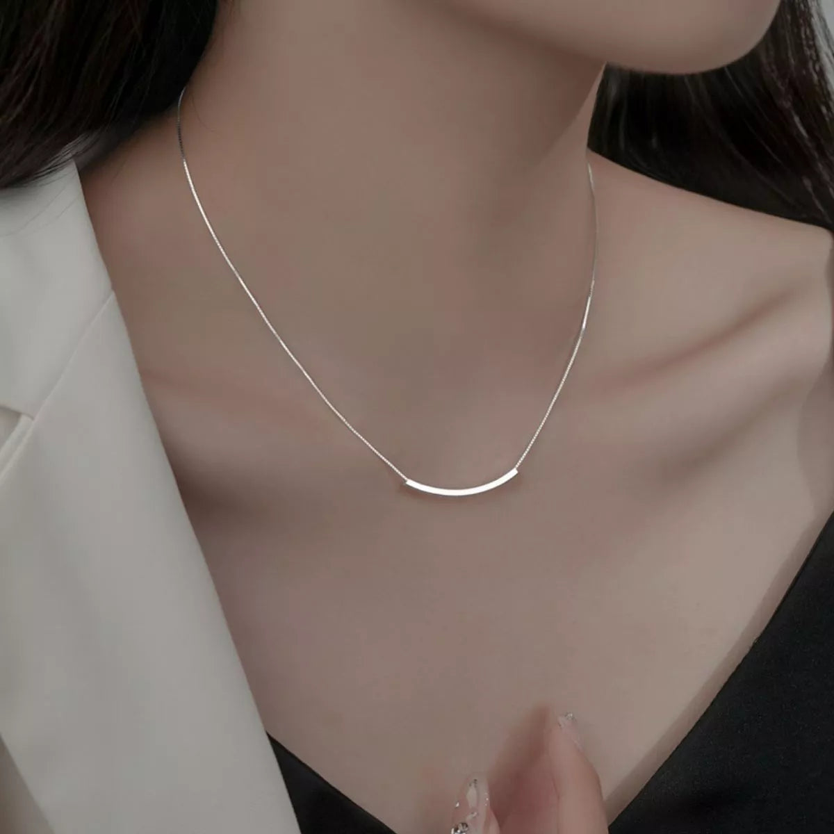 Sterling silver chain necklace from Trendsi featuring a sleek, minimalist silhouette design on a white background.