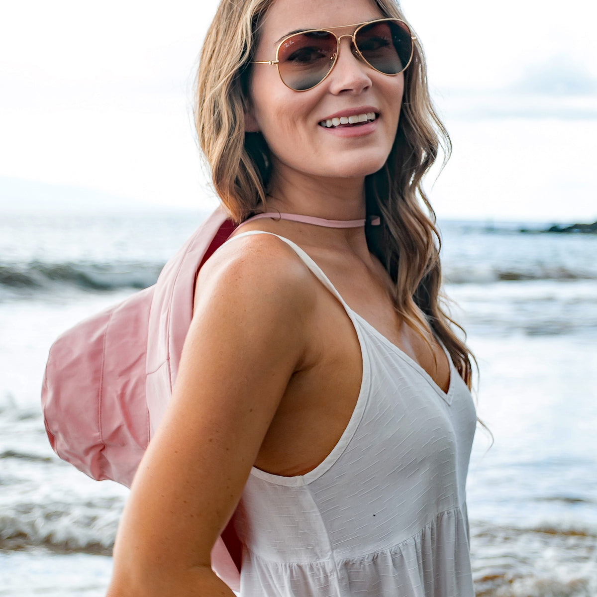 A person wears a black drawstring cargo hat from Aili's Corner, featuring a relaxed fit and adjustable drawstring brim.