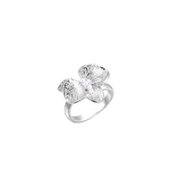 Silver-toned orchid ring with textured petals, pearl center accents, and sparkling zirconia stones on white background.