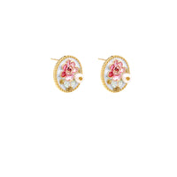 Gold-rimmed circular stud earrings with hand-painted pink peony enamel and pearl accents on white background