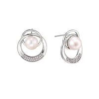 White gold-plated brass earrings with circular design, freshwater pearl center, and diamond accents