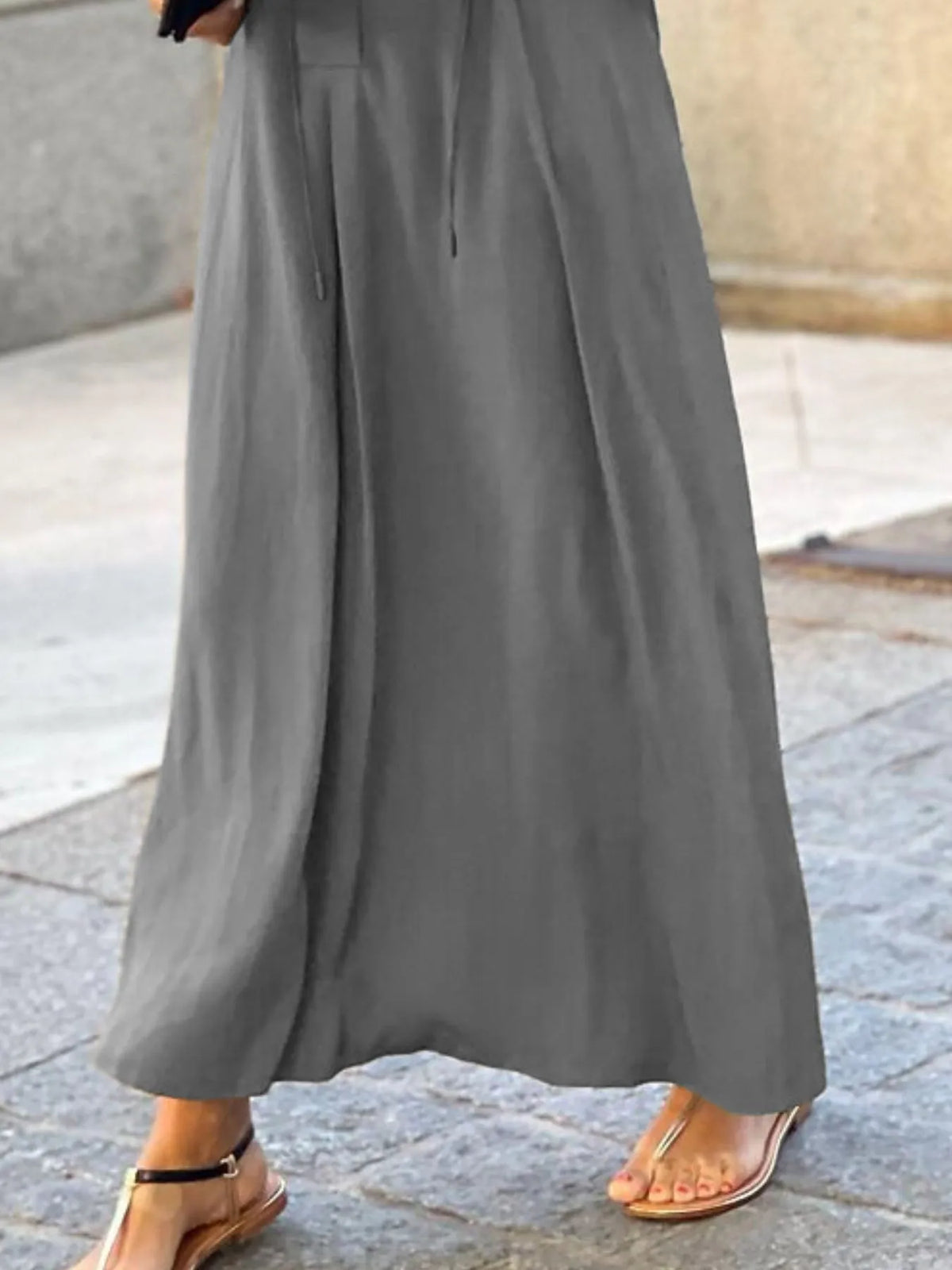 Solid color maxi shirt dress by Trendsi, featuring a relaxed fit, button-down front, and flowing silhouette.