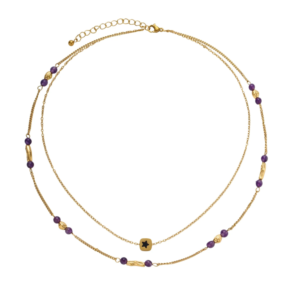 Two layered gold-tone necklaces with purple stone beads and star pendant against cream background.