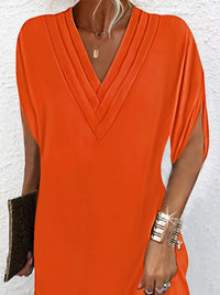 Plus size Trendsi full size mini dress featuring a V-neck and slit sleeves in a stylish design.