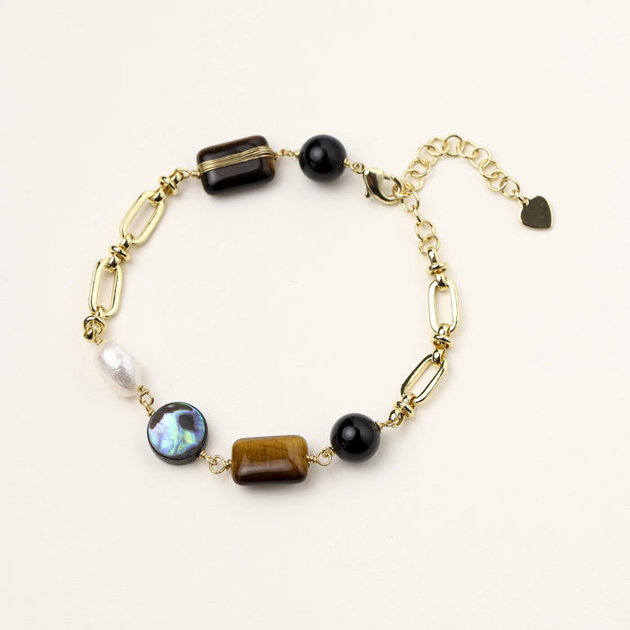 Earth Elements bracelet featuring natural stone beads and metallic accents from The Glambox Jewels Boutique.