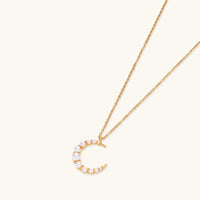 Luna Pearl Crescent Necklace by The Glambox Jewels Boutique featuring a delicate pearl crescent pendant on a fine chain