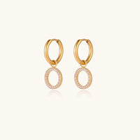 Elegant Halo Circle Hoops earrings from The Glambox Jewels Boutique, featuring shiny silver hoops with a smooth circular design.