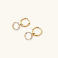 Halo circle hoop earrings by The Glambox Jewels Boutique featuring silver-tone metal and minimalist hoop design.