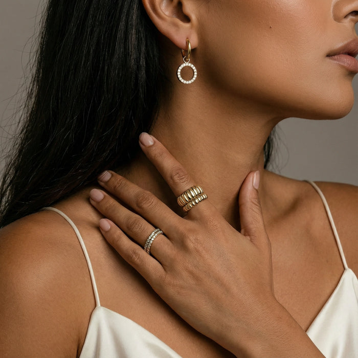 Gold Halo Circle Hoop Earrings from The Glambox Jewels Boutique featuring sleek hoop design with a smooth, polished finish.