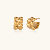 Silver braided hoops earrings from The Glambox Jewels Boutique with intricate woven design.