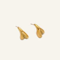 Sculpted drop earrings from The Glambox Jewels Boutique featuring elegant, curved design in gold-tone metal.
