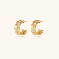Twisted Confidence hoops earrings by The Glambox Jewels Boutique, stylish gold-tone jewelry with a twisted design.