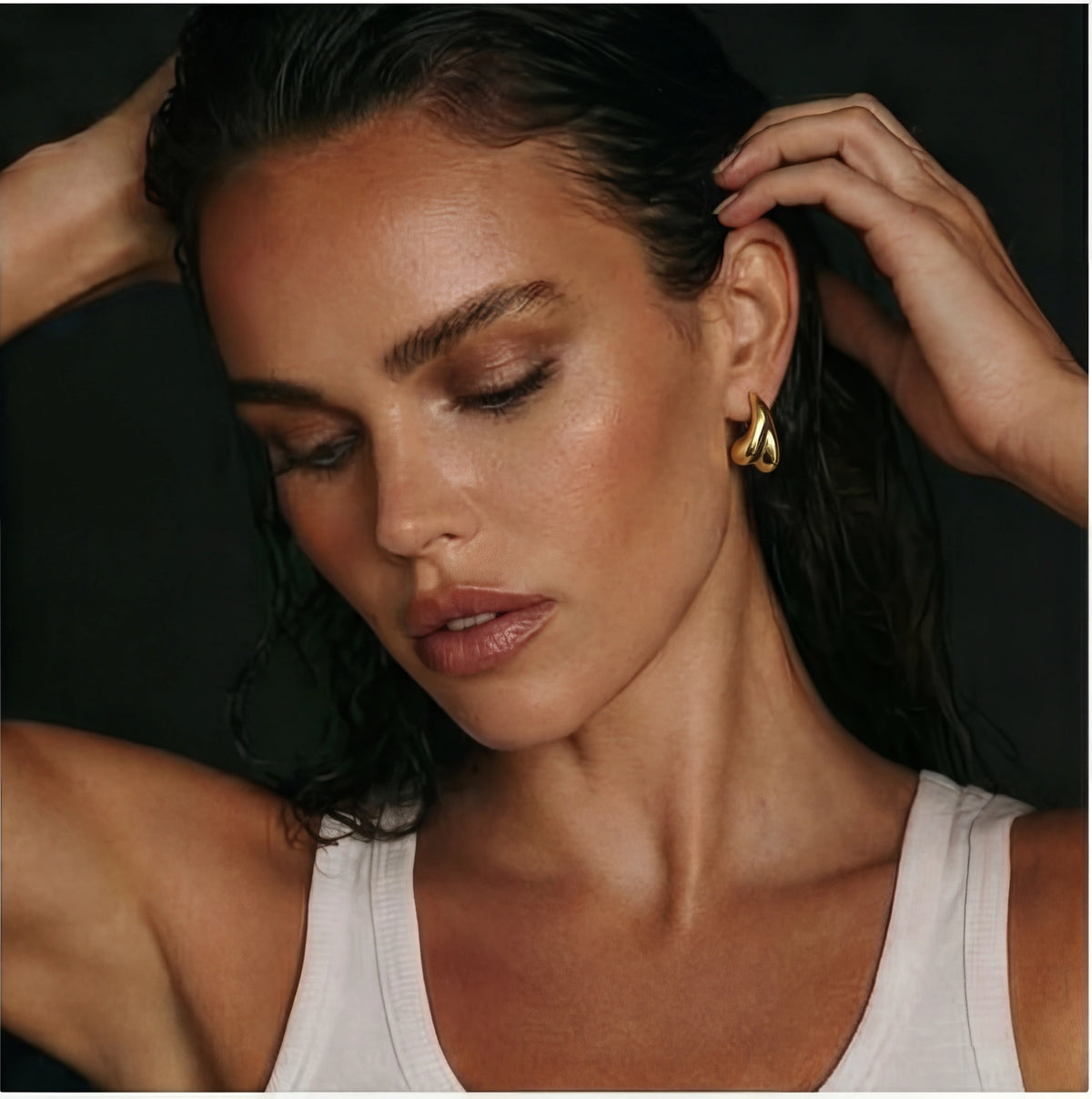 Sculpted drop earrings by The Glambox Jewels Boutique featuring elegant, curved metal design perfect for stylish accessories