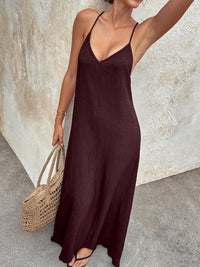 V-neck maxi cami dress by Trendsi featuring a flowy silhouette and sleeveless design, perfect for casual or dressy occasions.