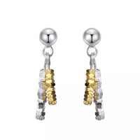 Delicate chain drop earrings with dainty design, featuring thin gold chains and small hanging accents, perfect for elegant jewelry styles.