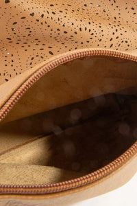 Trendsi Fame Intricate Cutout Motif shoulder handbag with detailed perforated design and elegant shape.