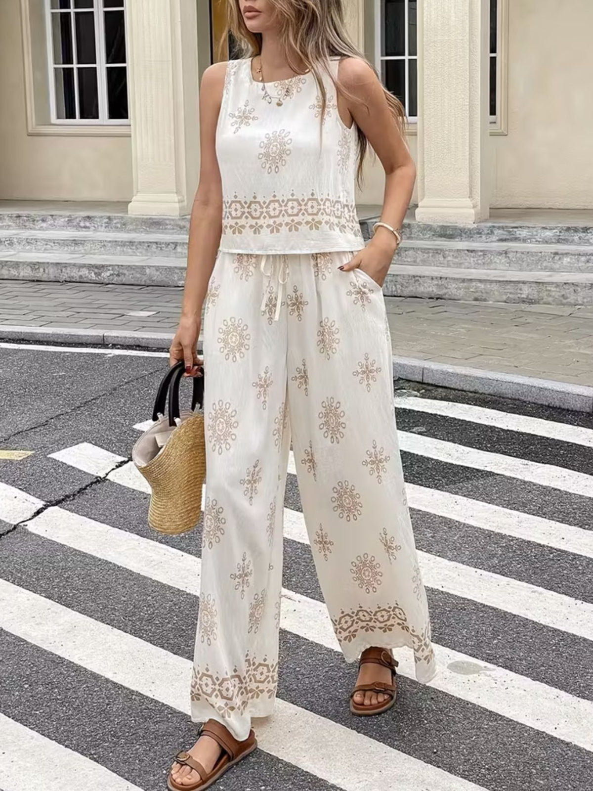 Trendsi sleeveless top and wide-leg pants two-piece set displayed on a model, stylish casual summer outfit for women.