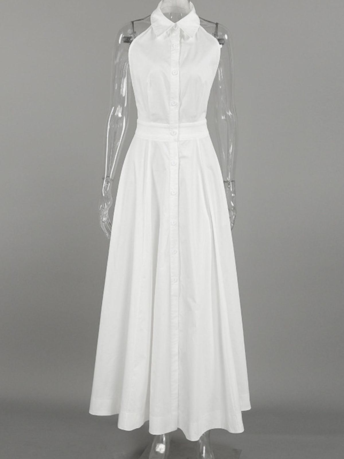 Backless button-front maxi dress by Trendsi featuring a flowing silhouette and elegant design, shown in a stylish fabric.