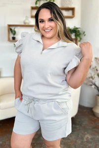 Trendsi Double Take Texture flounce sleeve top and drawstring shorts set, stylish two-piece outfit with textured fabric and relaxed fit.