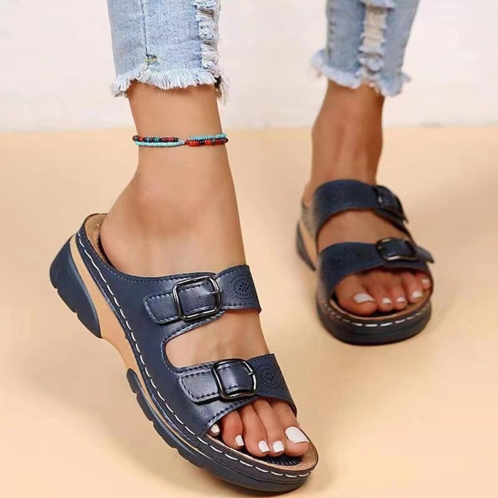 Trendsi double buckle open toe sandals featuring stylish straps and a comfortable flat sole, perfect for warm weather.