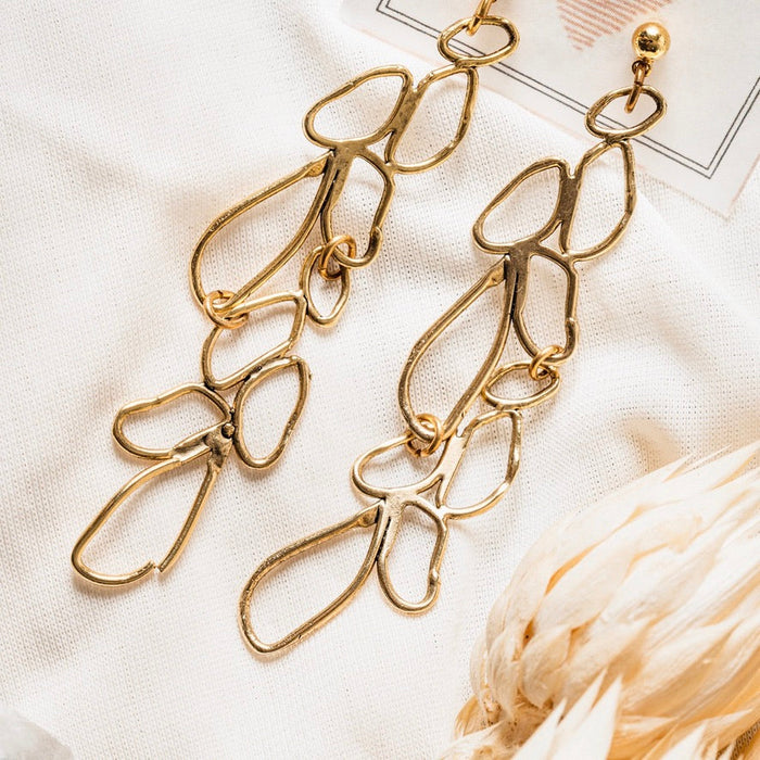 Long Moss Earrings by Tillydoro featuring delicate, leafy moss-inspired design in gold-tone metal.
