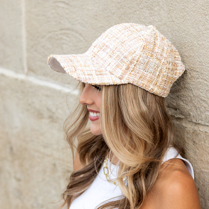 Aili's Corner tweed sparkle ball cap showing a stylish baseball cap with tweed fabric and sparkling embellishments.