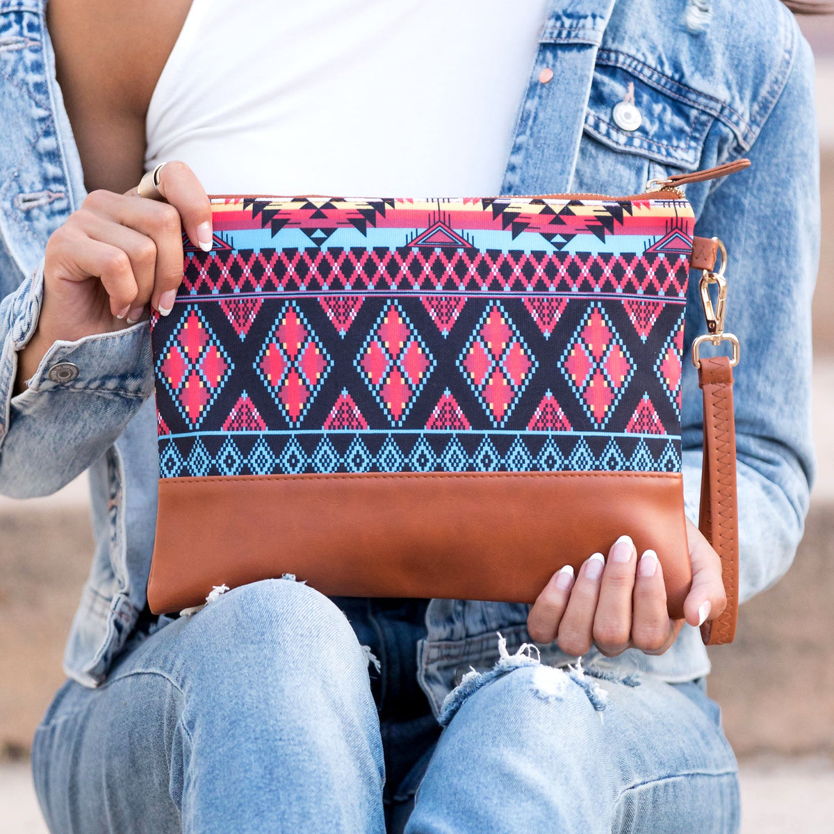 Aili's Corner Aztec Boho clutch bag with colorful woven pattern and zipper closure, perfect for casual or bohemian style.