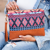 Aili's Corner Aztec Boho clutch bag with colorful geometric patterns and tassel details, stylish accessory for casual or evening wear.