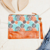 Aili's Corner Aztec Boho clutch bag with colorful woven pattern and tassel details, perfect for casual or bohemian style.