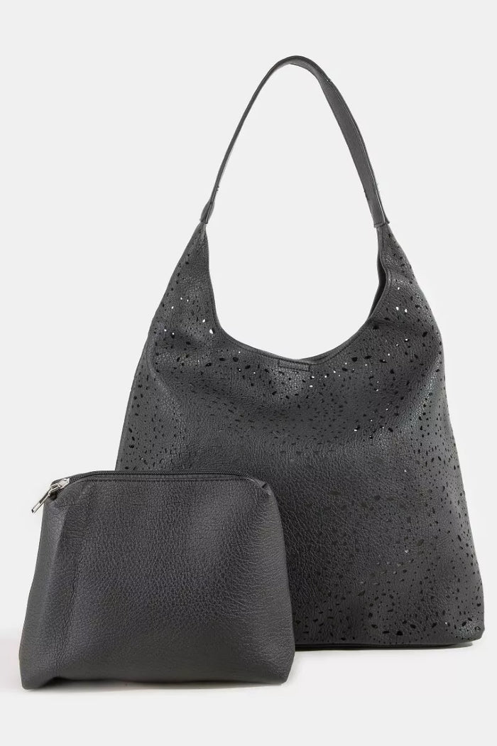 Trendsi Fame shoulder bag with intricate cutout motif, stylish handbag accessory featuring detailed design and structured shape.