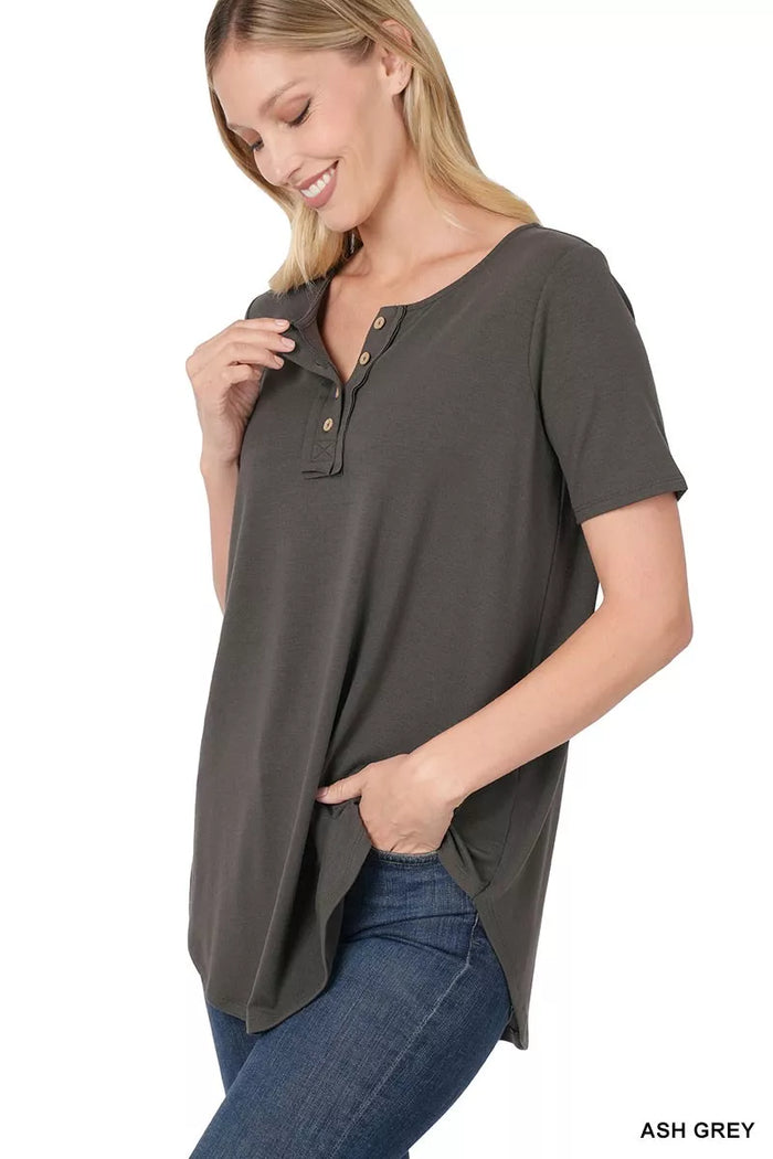 Zenana short sleeve button-down blouse in a classic style, featuring a collared neckline and front buttons, perfect for casual wear.