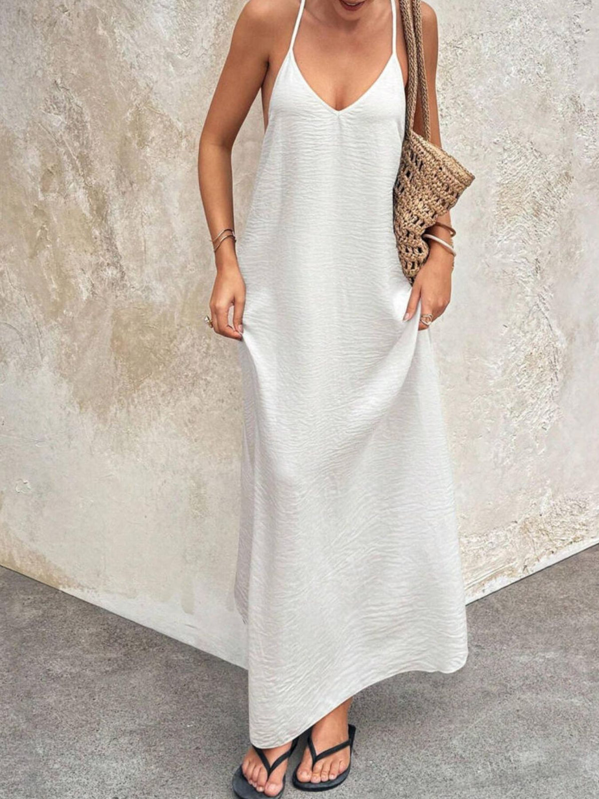 V-neck maxi cami dress from Trendsi, featuring a flowing silhouette and lightweight fabric perfect for casual or summer wear.