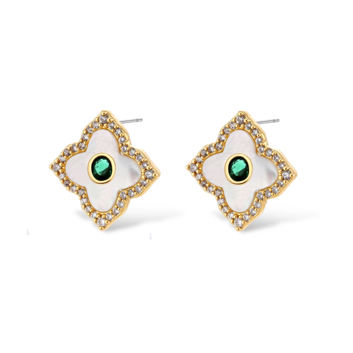 Gold-plated quatrefoil pendant and earrings with white enamel, emerald CZ center stones, and crystal borders on white background.