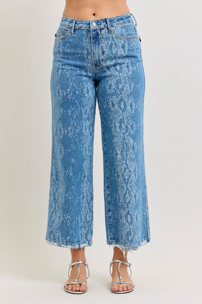 Light blue Judy Blue high-rise ankle wide-leg jeans with distressed details and a relaxed fit, showcasing front view.