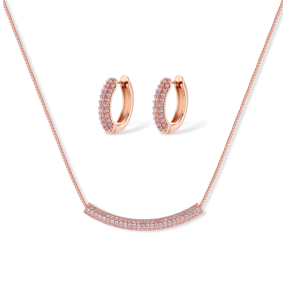 Rose gold jewelry set with pavé cubic zirconia stones including curved necklace, hoop earrings, and adjustable ring on cream background.