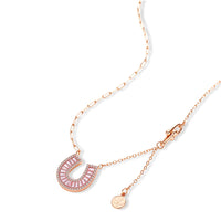 Sparkling horseshoe-shaped jewelry set with AAA cubic zirconia in gold-plated and white gold finishes on cream background.