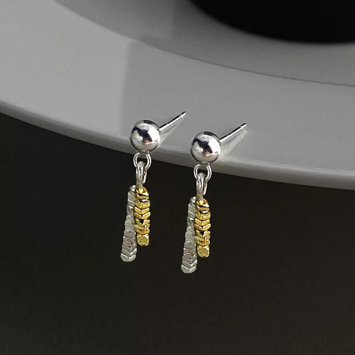 Delicate chain drop earrings featuring fine metal links, stylish and lightweight jewelry by Trendsi.