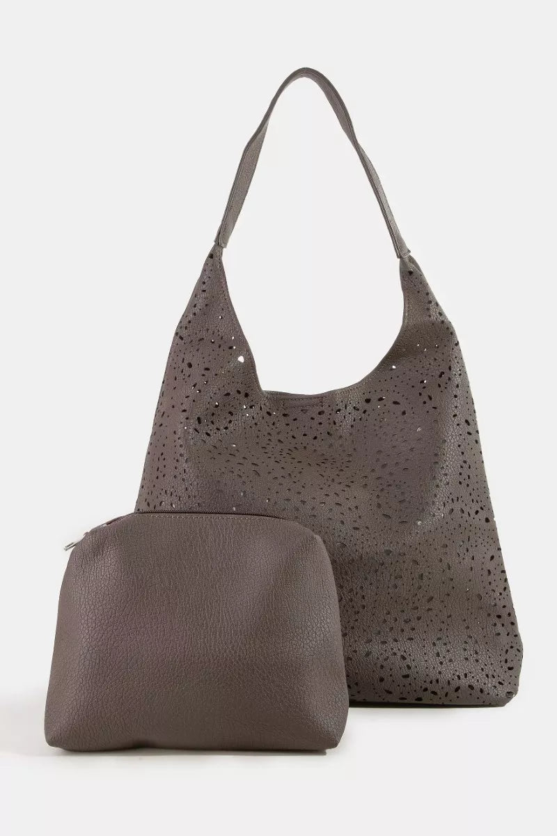 Fame Intricate Cutout Motif shoulder bag by Trendsi, featuring detailed cutouts and a stylish design for handbag accessories.
