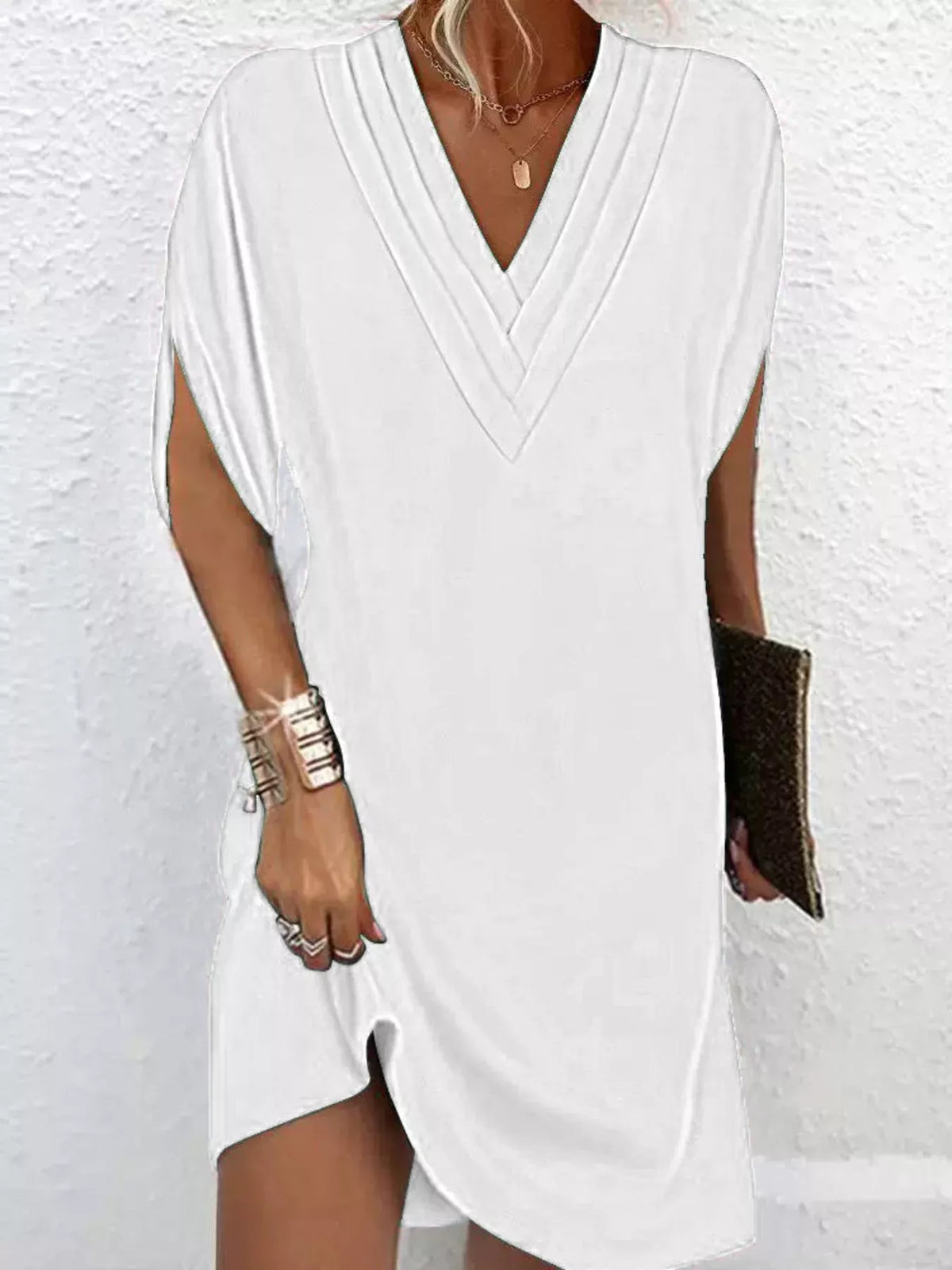 Full size Trendsi v-neck mini dress with slit sleeves, showcasing a stylish and comfortable plus size design.
