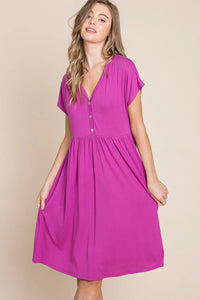 V-Neck button front dress by Trendsi, featuring a stylish V-neckline and button details, perfect for casual or dressy occasions.