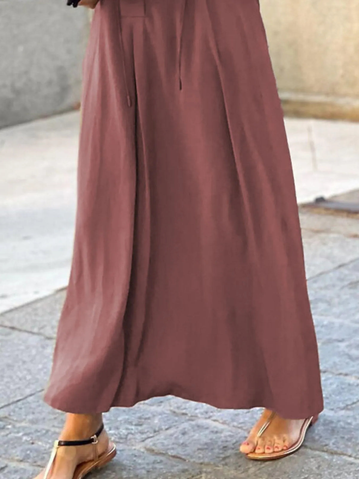 Trendsi solid color maxi shirt dress featuring a relaxed fit and button-down design, ideal for casual outings.