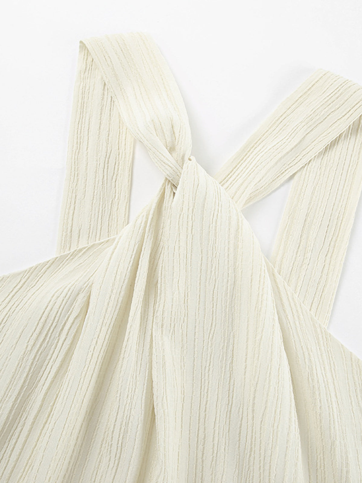 Halter neck maxi dress by Trendsi featuring a flowing silhouette, sleeveless design, and elegant style for summer occasions.